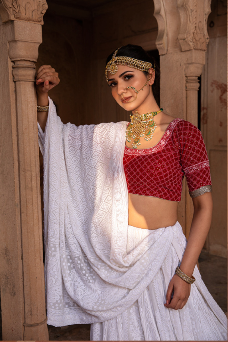 White heavy chikan lehenga